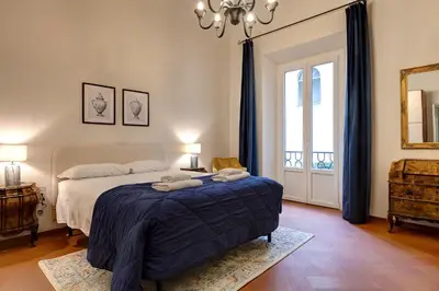Letto o letti in una camera di Pergola Apartment by Mamo Florence