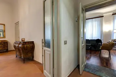 Area soggiorno di Pergola Apartment by Mamo Florence