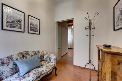 Area soggiorno di Pergola Apartment by Mamo Florence