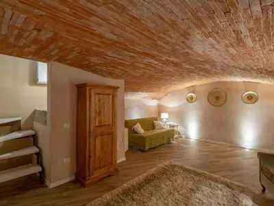 Area soggiorno di Apartment Gemütliche Ferienwohnung Le Volte by Interhome