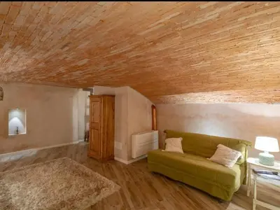 Letto o letti in una camera di Apartment Gemütliche Ferienwohnung Le Volte by Interhome