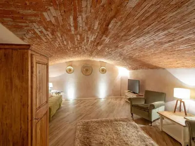 TV o dispositivi per l'intrattenimento presso Apartment Gemütliche Ferienwohnung Le Volte by Interhome