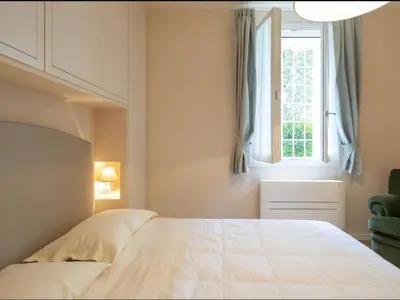 Letto o letti in una camera di Apartment Gemütliche Ferienwohnung Le Volte by Interhome
