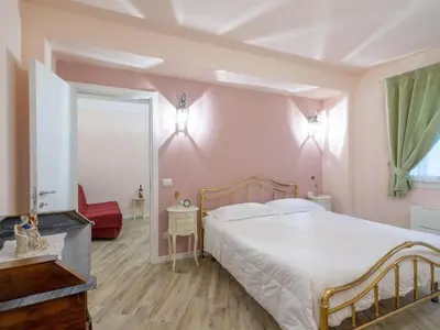 Letto o letti in una camera di Apartment Rosa in der Toskana by Interhome