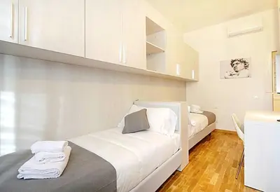 Letto o letti in una camera di La Marmora Elegant