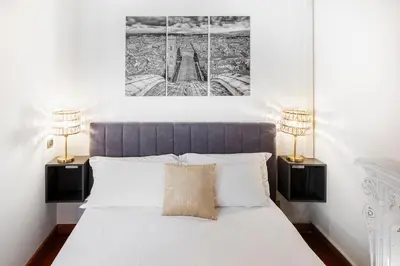 Letto o letti in una camera di Next to Uffizi e Signoria - Historic Residence