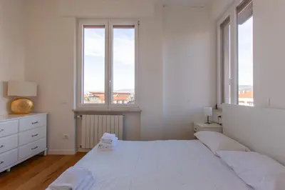 Letto o letti in una camera di GuestHost - Santa Maria Novella Charming Apartment