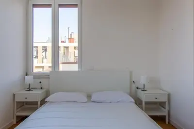 Letto o letti in una camera di GuestHost - Santa Maria Novella Charming Apartment