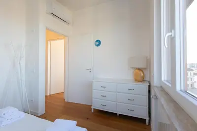 Letto o letti in una camera di GuestHost - Santa Maria Novella Charming Apartment