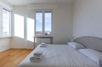 Letto o letti in una camera di GuestHost - Santa Maria Novella Charming Apartment