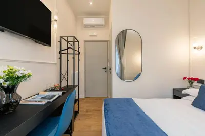 Letto o letti in una camera di Fiume Boutique Guest house