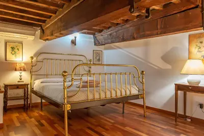 Letto o letti in una camera di Rondinelli Mdr Apartments Collection