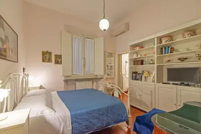 Letto o letti in una camera di Rondinelli Mdr Apartments Collection