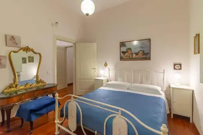 Letto o letti in una camera di Rondinelli Mdr Apartments Collection