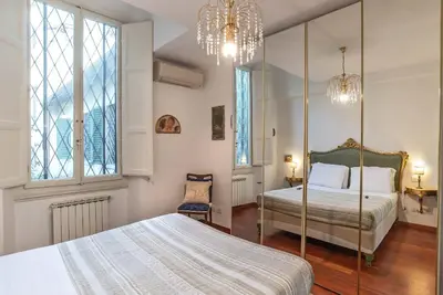 Letto o letti in una camera di Rondinelli Mdr Apartments Collection