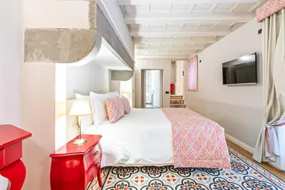 Letto o letti in una camera di Dimora del Cardinale - Authentic Historic Residence