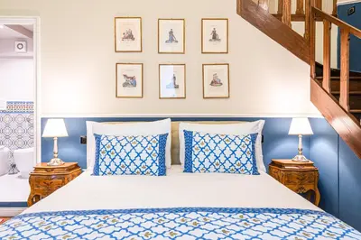 Letto o letti in una camera di Dimora del Cardinale - Authentic Historic Residence