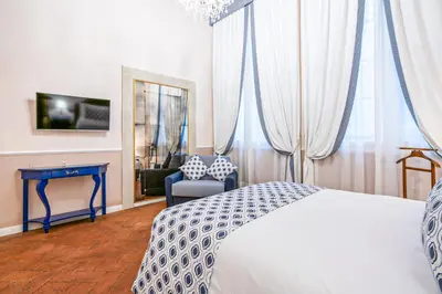 Letto o letti in una camera di Dimora del Cardinale - Authentic Historic Residence