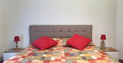 Letto o letti in una camera di Casa Puccini
