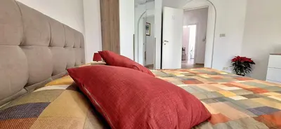 Letto o letti in una camera di Casa Puccini