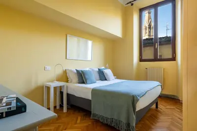 Letto o letti in una camera di Bright and Spacious Arno View Apartment