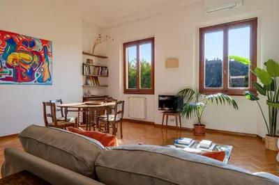 Area soggiorno di Bright and Spacious Arno View Apartment