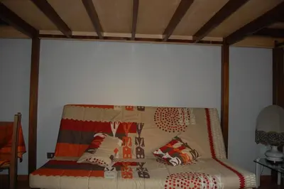 Letto o letti in una camera di B&B Porta San Frediano