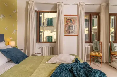 Letto o letti in una camera di Casa Boboli