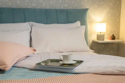 Letto o letti in una camera di Casa Boboli