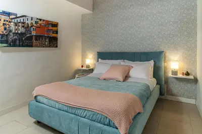 Letto o letti in una camera di Casa Boboli