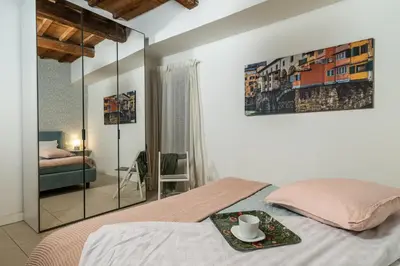 Letto o letti in una camera di Casa Boboli