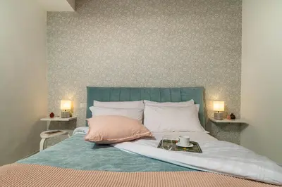 Letto o letti in una camera di Casa Boboli