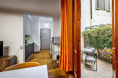 Letto o letti in una camera di YD San Niccolo riverside apartment