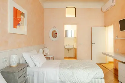 Letto o letti in una camera di Art Apartment Oltrarno