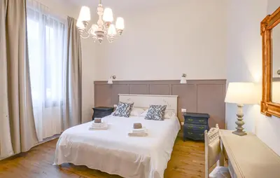 Letto o letti in una camera di Lovely Apartment In Firenze With Wifi