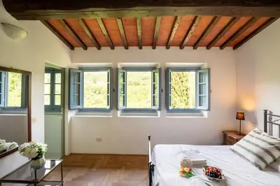 Letto o letti in una camera di Cavato Il Capriolo - Fabulous Homes Design