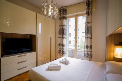 Letto o letti in una camera di Arrigo Boutique Apartment