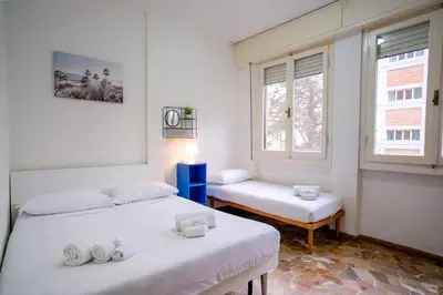 Letto o letti in una camera di Arrigo Boutique Apartment