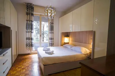 Letto o letti in una camera di Arrigo Boutique Apartment