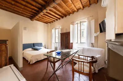 Letto o letti in una camera di MediciApt - Alfani studio near Duomo