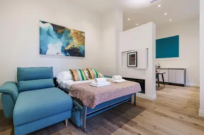 Letto o letti in una camera di Petrarca Home, Firenze
