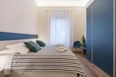 Letto o letti in una camera di Petrarca Home, Firenze