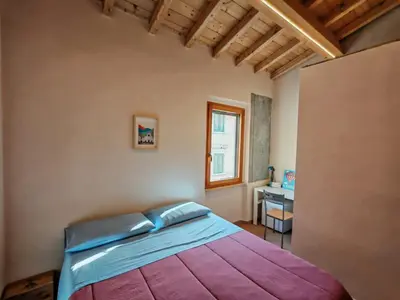 Letto o letti in una camera di Easy Home