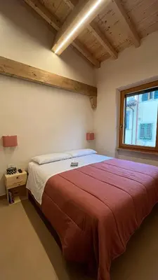 Letto o letti in una camera di Easy Home