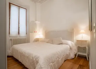 Letto o letti in una camera di Il Gigliolo Apartment