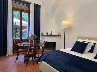Letto o letti in una camera di Arnolds Deluxe