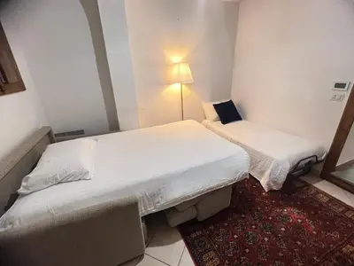 Letto o letti in una camera di Arnolds Deluxe