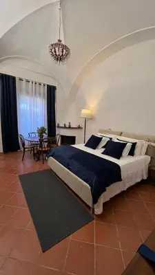 Letto o letti in una camera di Arnolds Deluxe