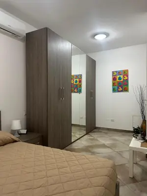 Letto o letti in una camera di New Florence Smart Flat - Parking & Tram Stop
