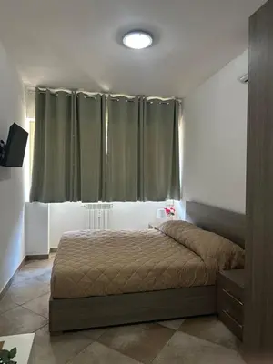 Letto o letti in una camera di New Florence Smart Flat - Parking & Tram Stop